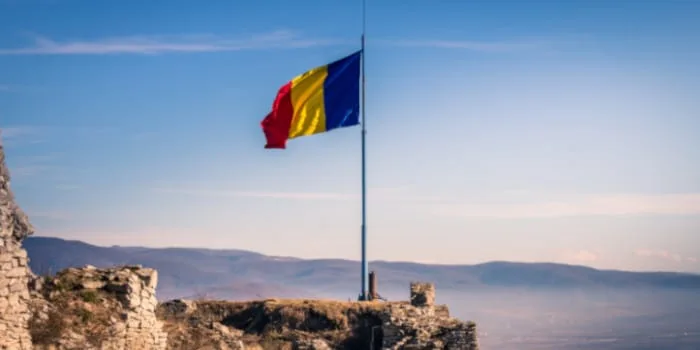 news-romanian-flag-waving-on-a-pole